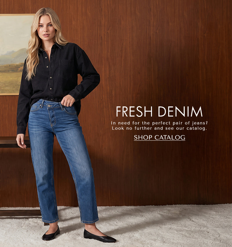 A model wearing black oversized shirt with asymmetrical jeans and black flats. Text reading "Fresh Denim: In need for the perfect of jeans? Look no further and see our catalog.' CTA reading Shop Catalog